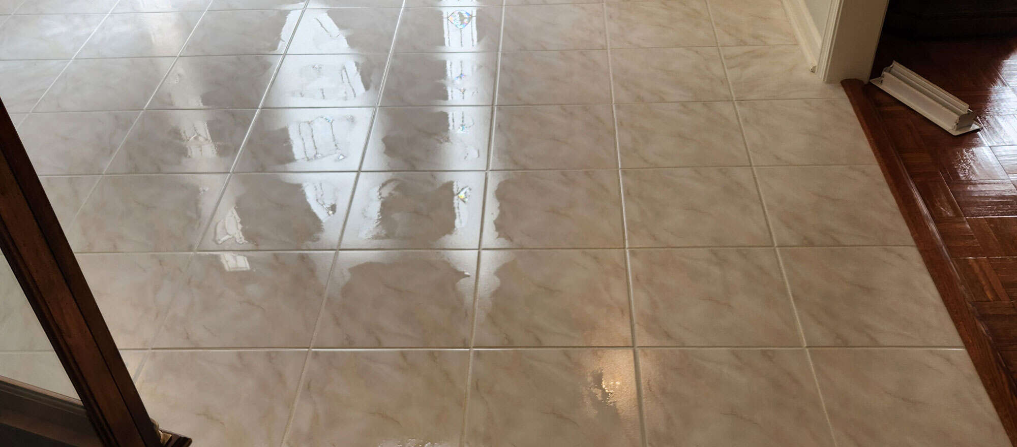 Clean tiled floor after grout cleaning