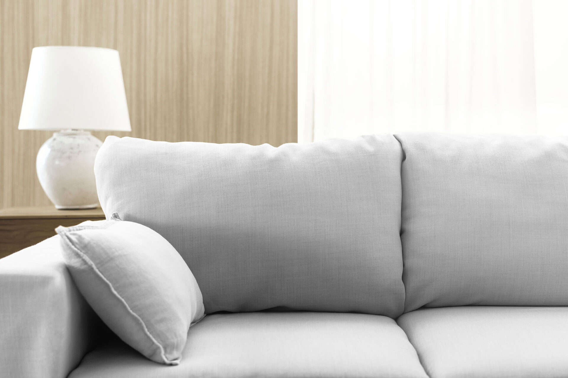 Clean sofa after deep upholstery cleaning